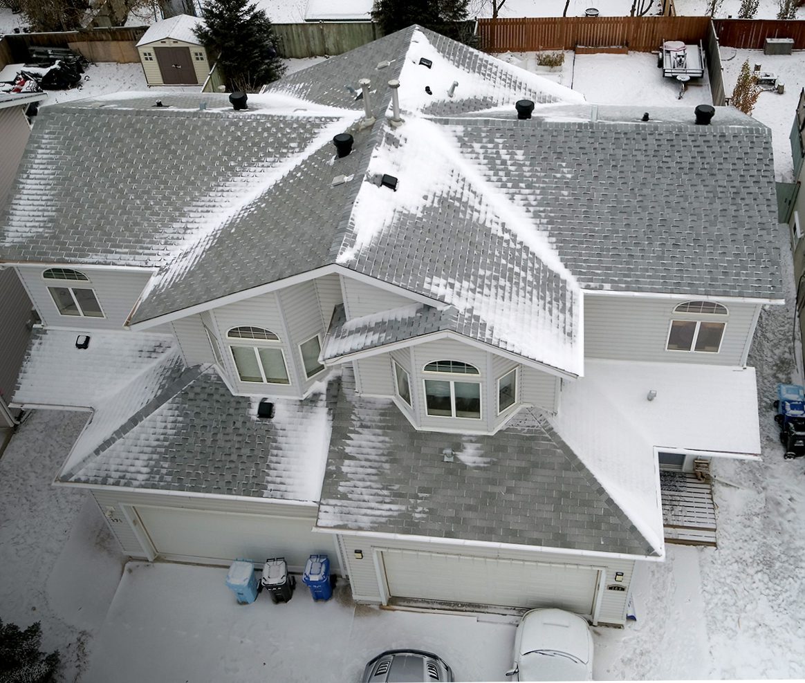 Roof covered in gray shingles